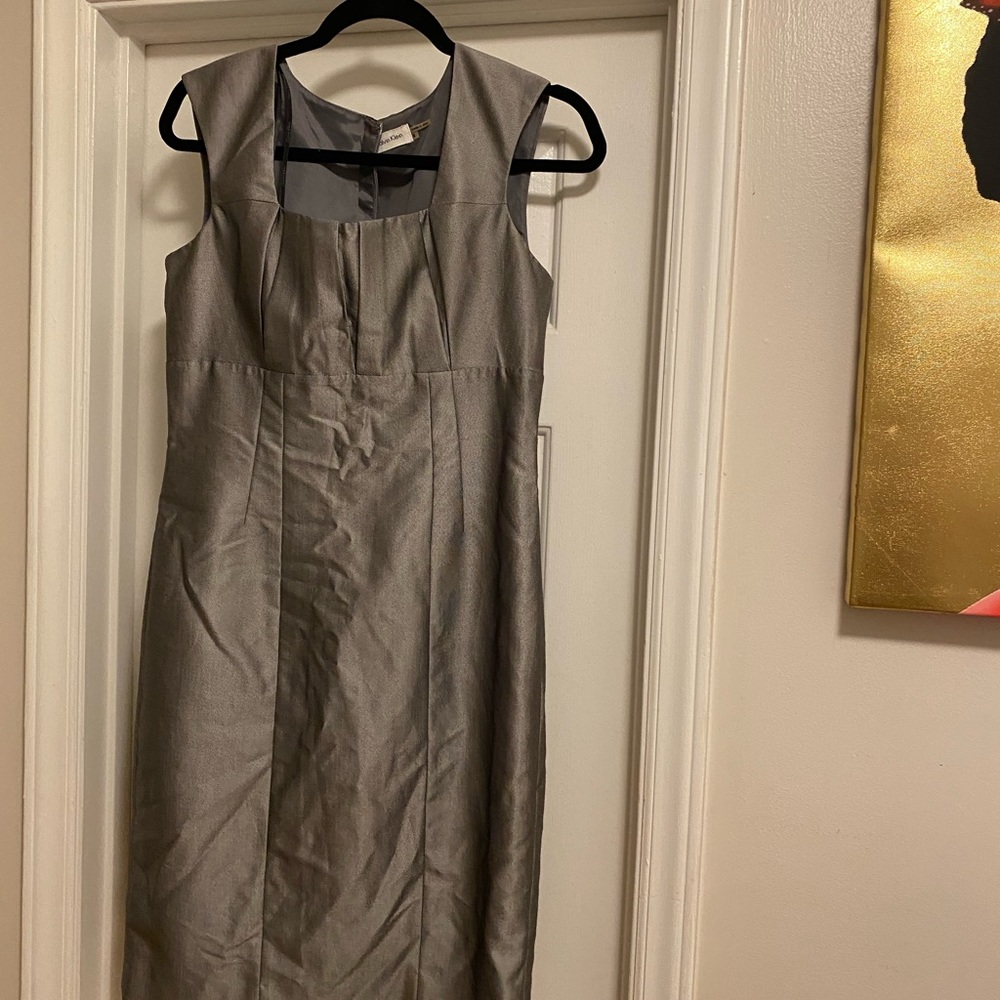 Sleeveless, grey pleated, knee length dress
